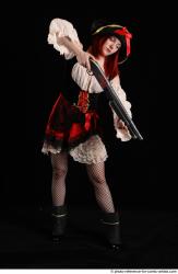 DARINA STANDING POSE WITH SHOTGUN